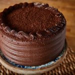homemade chocolate cake with many layers of chocolate sauce