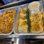 Chicken and spaghetti in catering foil trays