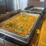 Pasta Bolognese in catering foil tray