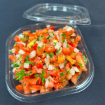 large side of salsa in a plastic container