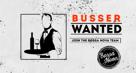 man holding tray with drinks busser wanted sign