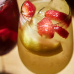glass with homemade white wine sangria and fruits