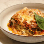 Lasagna with vegetables and spinach layers