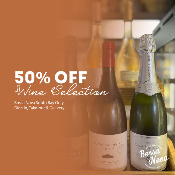 50% Off Wine Selection bottles on wooden table