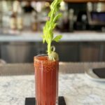 Bloody Mary cocktail on a marble bar counter